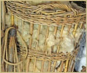 A basket of sheep's wool in the museum at Cotswold Woollen Weavers