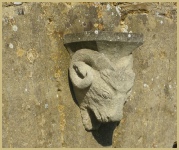 A sheep's head carved in limestone at Cotswold Woollenn Weavers