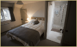 Beautiful bedroom two, mullion windows, ensuite bath room with shower