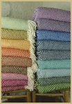 The range of Shetland Chevron throws from Cotswold Woollen Weavers